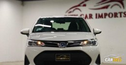 Toyota Axio Hybrid white 2019 Recondition Car